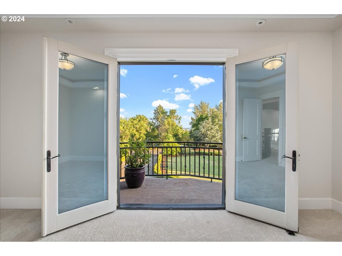 9400 Southwest Inverness Way Beaverton, OR 97007 - Photo 33 of 48 a view of a glass door and a window