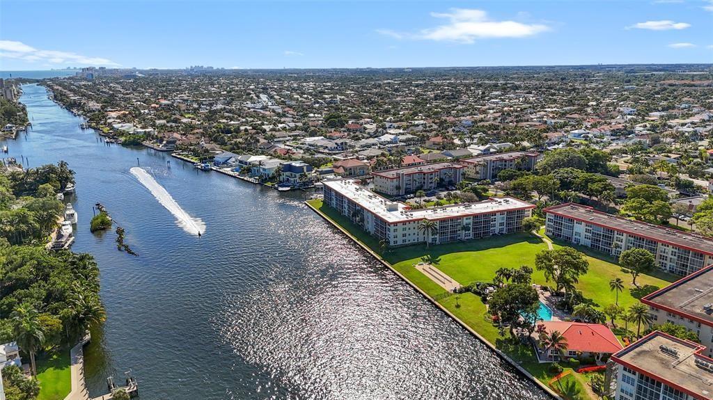 3100 Northeast 48th Court, Unit 413 Lighthouse Point, FL 33064 - Photo 29 of 32 an aerial view of a residential houses with outdoor space