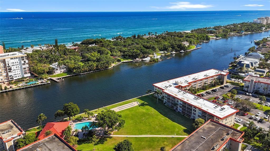 3100 Northeast 48th Court, Unit 413 Lighthouse Point, FL 33064 - Photo 32 of 32 an aerial view of a house with a lake view