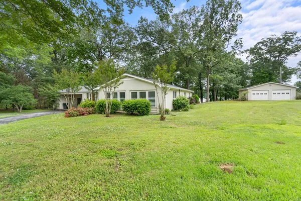 a house view with a garden space