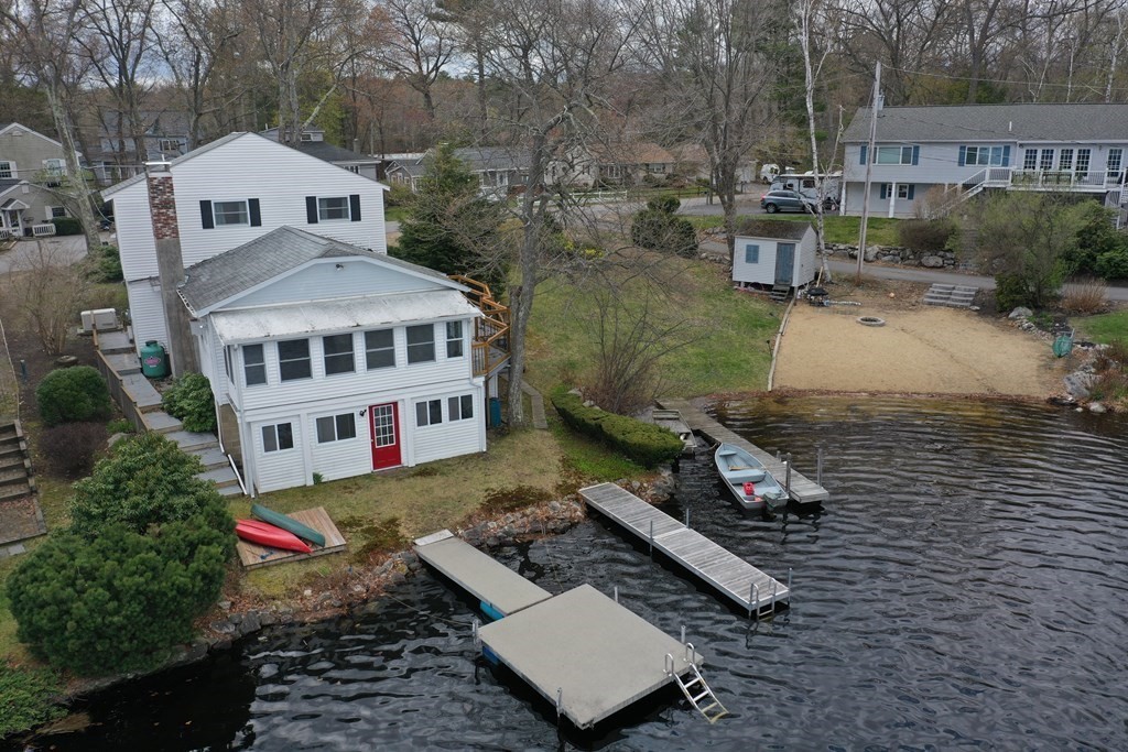 75 Conleys Grove Road Derry, NH 03038 - Photo 1 of 41 an aerial view of a house with a yard
