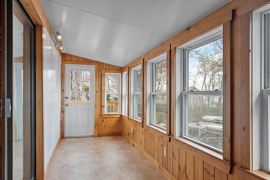 75 Conleys Grove Road Derry, NH 03038 - Photo 18 of 41 a view of a big room with windows and refrigerator