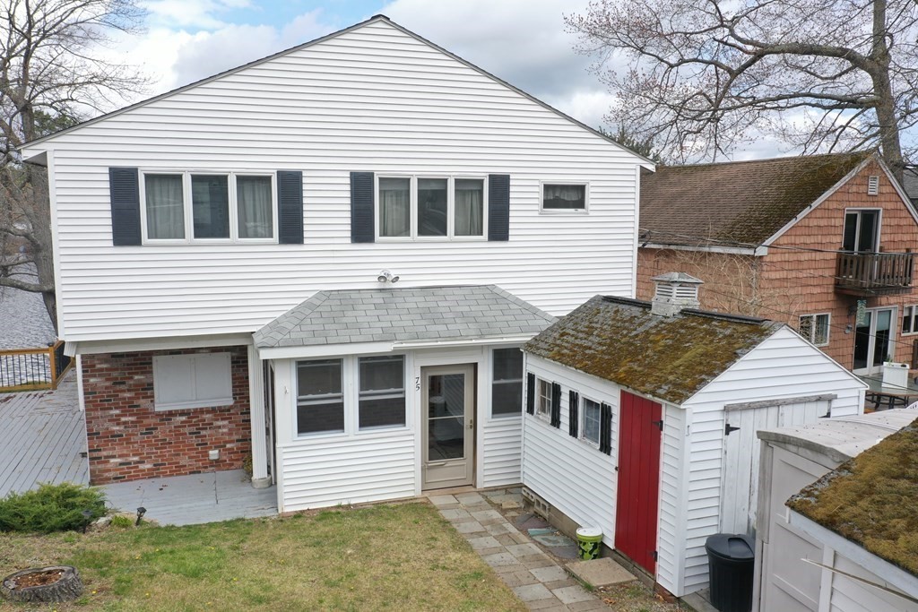 75 Conleys Grove Road Derry, NH 03038 - Photo 37 of 41 a front view of a house with a yard