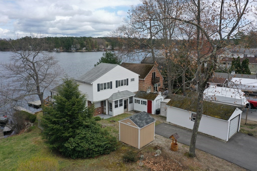 75 Conleys Grove Road Derry, NH 03038 - Photo 40 of 41 an aerial view of a house with a yard