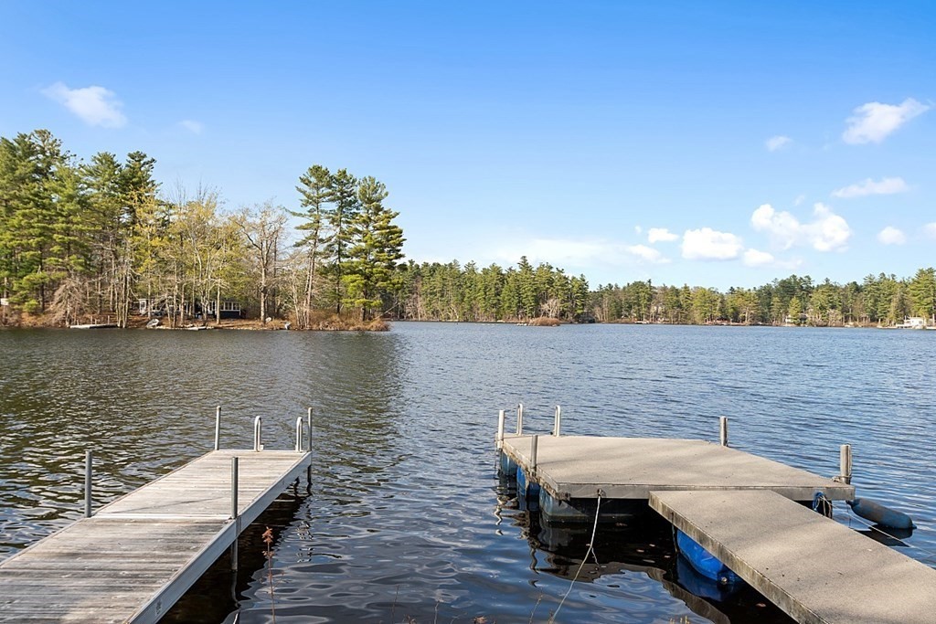 75 Conleys Grove Road Derry, NH 03038 - Photo 7 of 41 a view of a lake from a roof deck