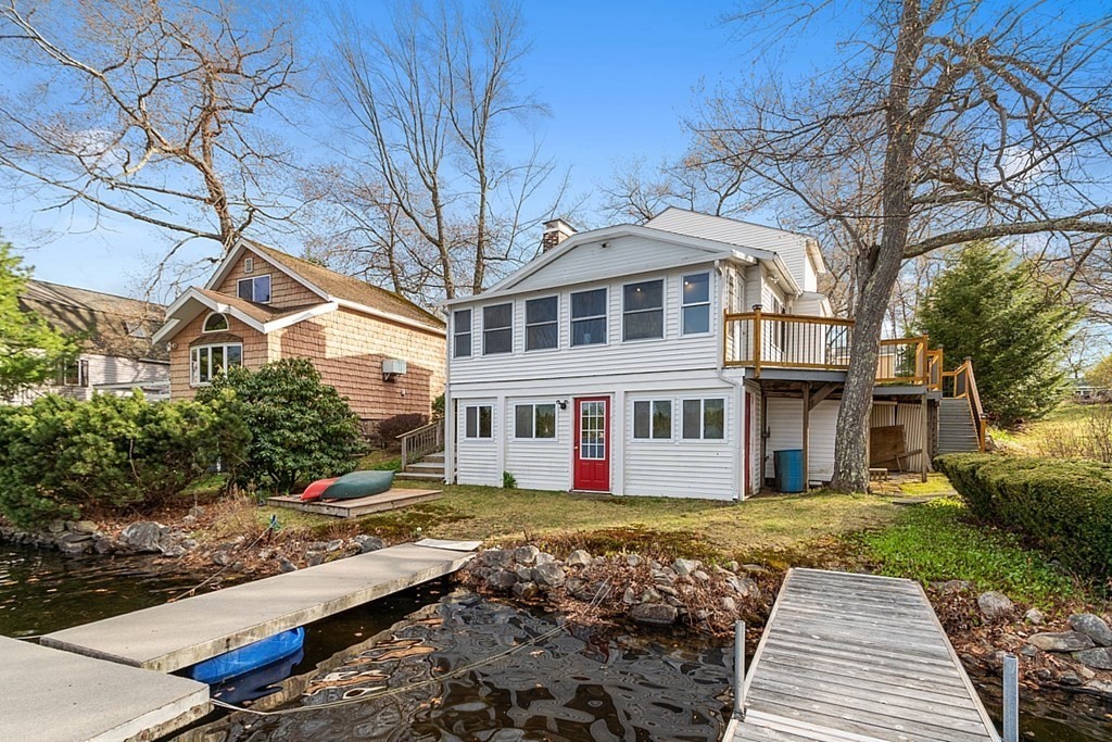 75 Conleys Grove Road Derry, NH 03038 - Photo 8 of 41 a front view of a house with a garden