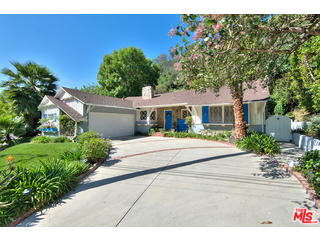 2139 Roscomare Road Los Angeles, CA 90077 - Photo 1 of 21 a front view of a house with a yard