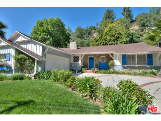 2139 Roscomare Road Los Angeles, CA 90077 - Photo 2 of 21 a front view of a house with a yard