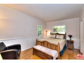 2139 Roscomare Road Los Angeles, CA 90077 - Photo 12 of 21 a bedroom with a bed window and couch