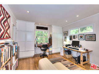 2139 Roscomare Road Los Angeles, CA 90077 - Photo 15 of 21 a workspace with furniture hardwood and a window