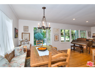 2139 Roscomare Road Los Angeles, CA 90077 - Photo 9 of 21 a living room with furniture and a table