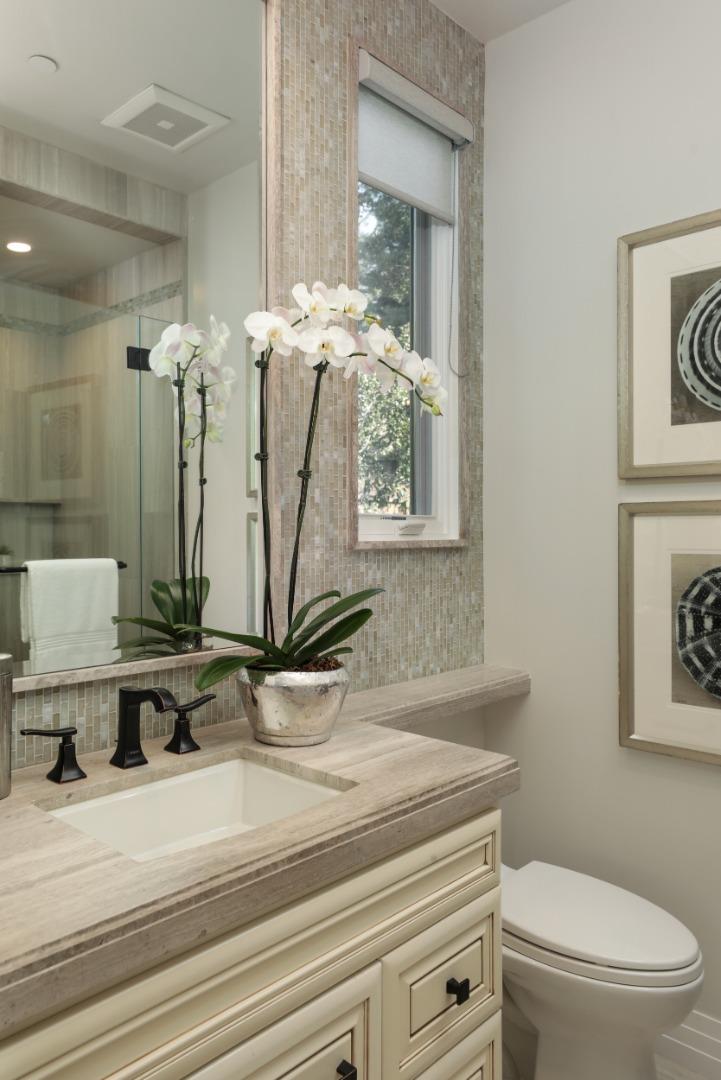 9 Park Drive Atherton, CA 94027 - Photo 18 of 56 a bathroom with a sink a mirror and a toilet
