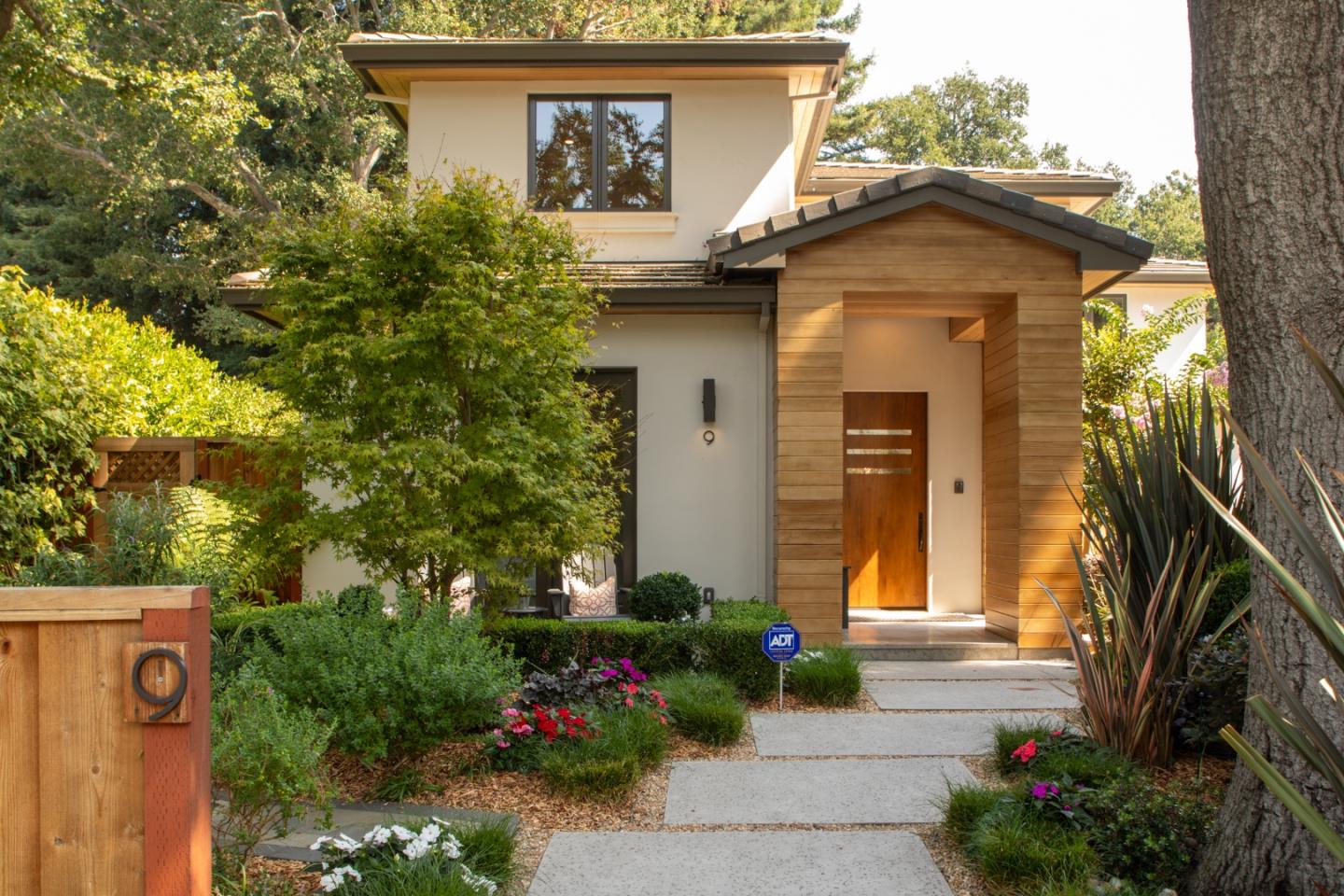 9 Park Drive Atherton, CA 94027 - Photo 2 of 56 a front view of a house with a yard