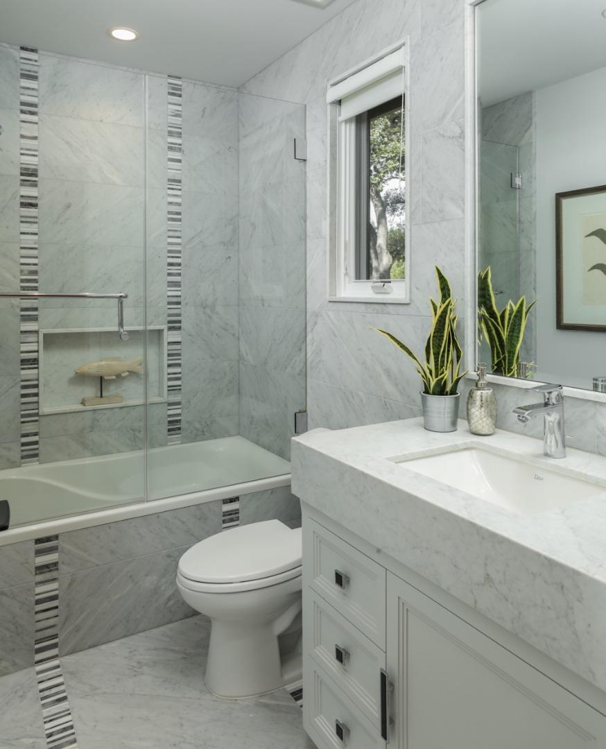 9 Park Drive Atherton, CA 94027 - Photo 28 of 56 a bathroom with a granite countertop toilet a sink and bathtub