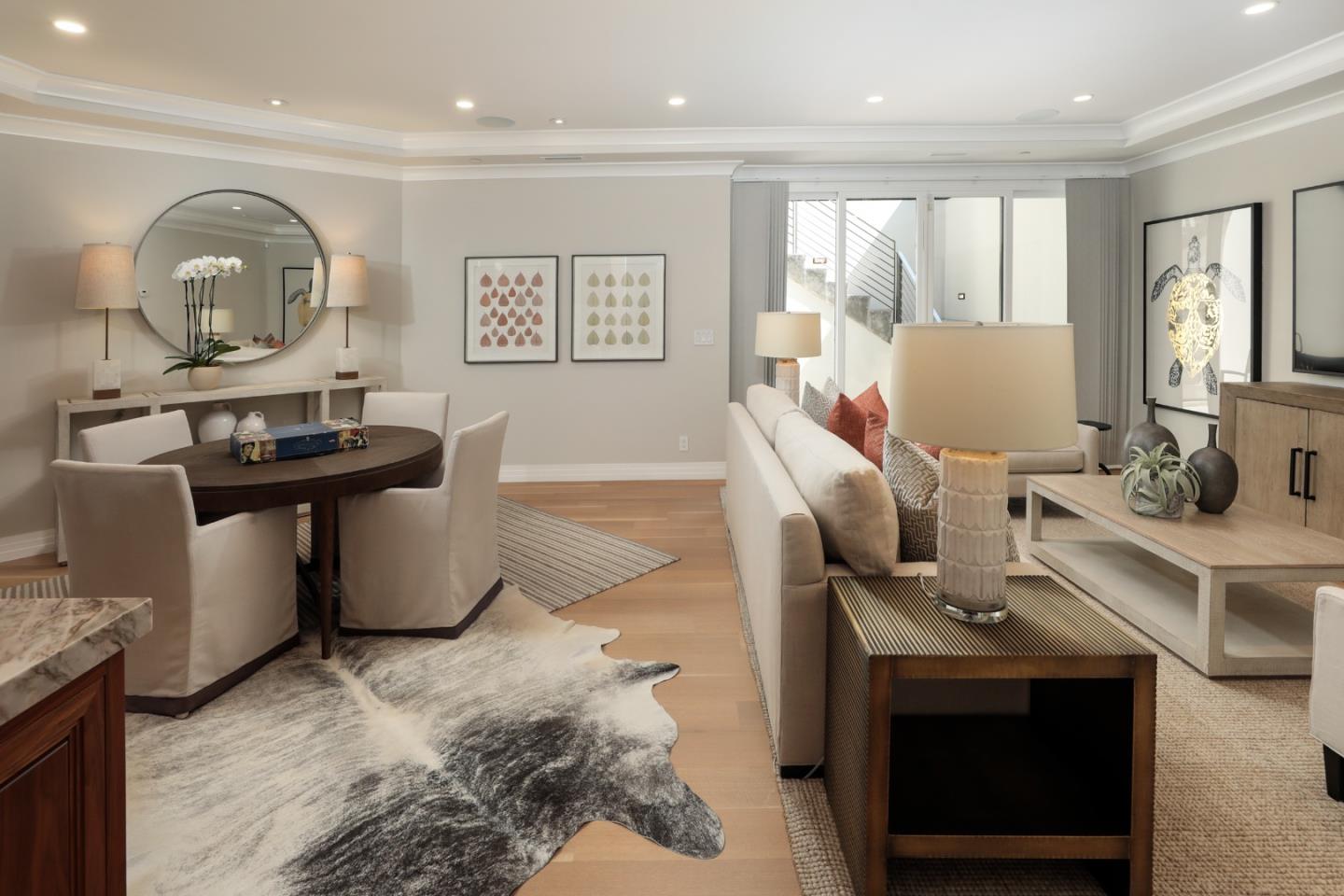 9 Park Drive Atherton, CA 94027 - Photo 35 of 56 a living room with furniture a wooden floor and a large window