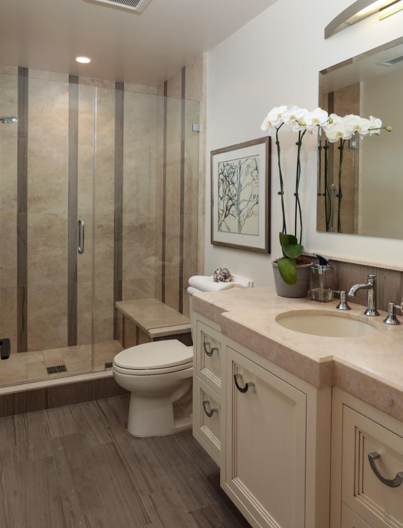 9 Park Drive Atherton, CA 94027 - Photo 38 of 56 a bathroom with a toilet sink and mirror
