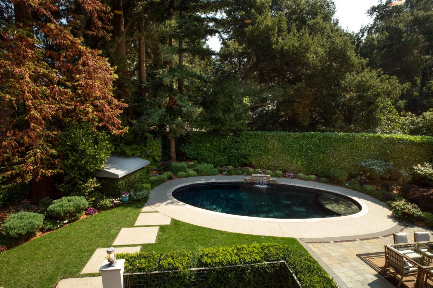 9 Park Drive Atherton, CA 94027 - Photo 40 of 56 a view of a swimming pool with a yard