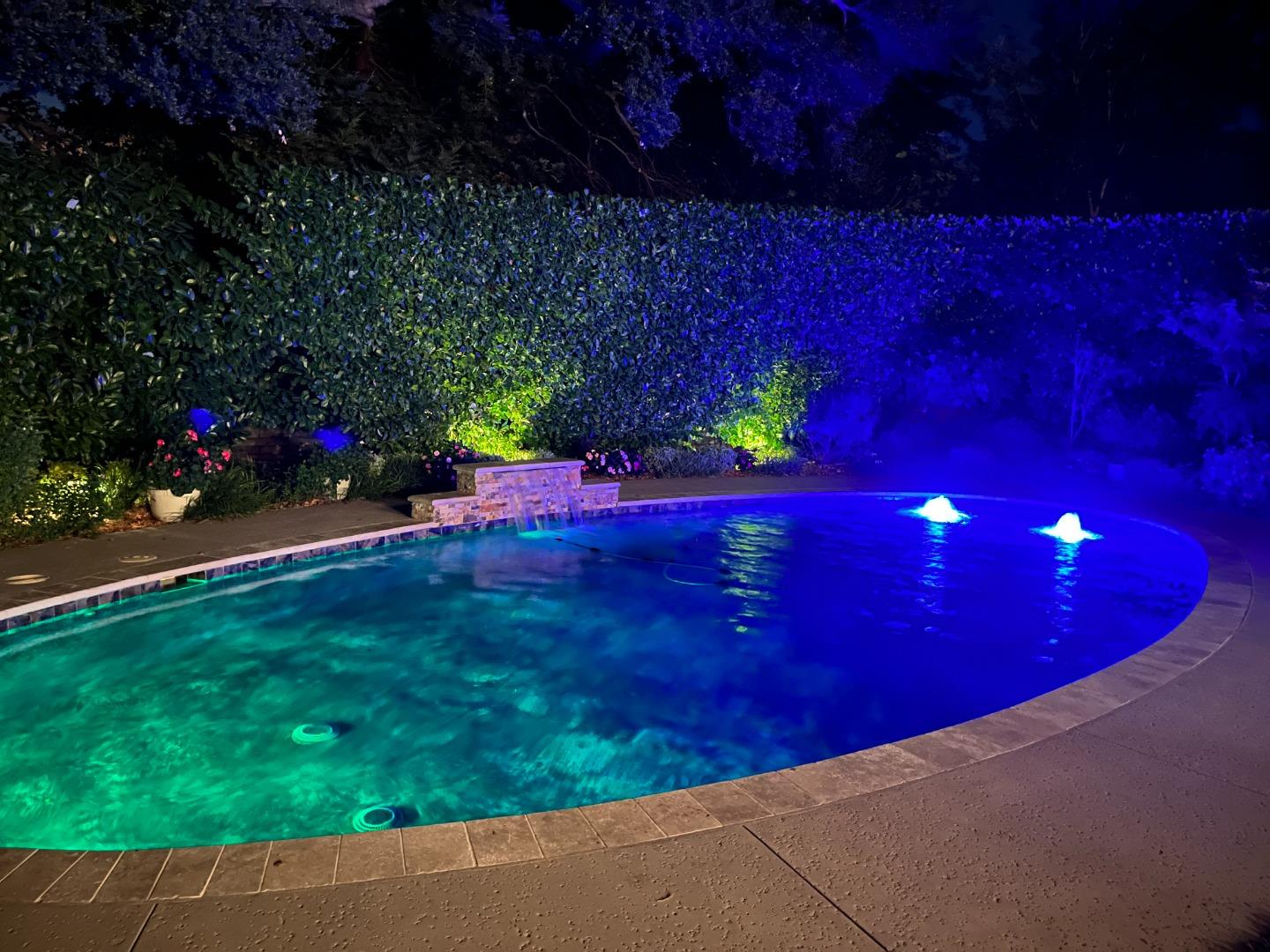 9 Park Drive Atherton, CA 94027 - Photo 54 of 56 a view of a backyard with table and chairs with wooden fence