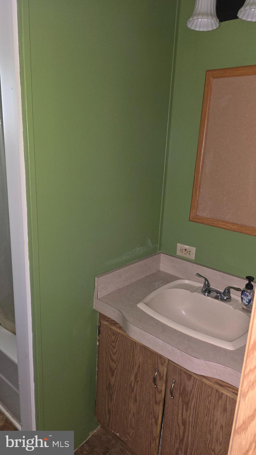 2032 Church Road York, PA 17408 - Photo 23 of 28 a bathroom with a sink and a mirror