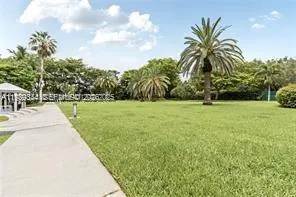 a view of a swimming pool with a garden