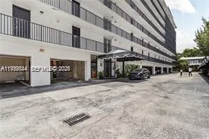 a view of a building with sitting area