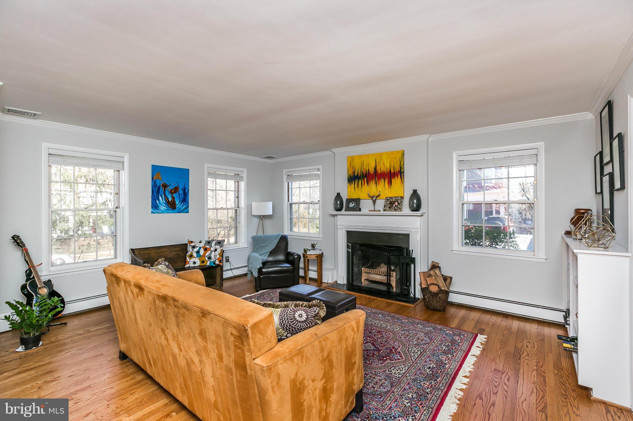 1 Beechdale Road Baltimore, MD 21210 - Photo 5 of 28 a living room with furniture fireplace and window