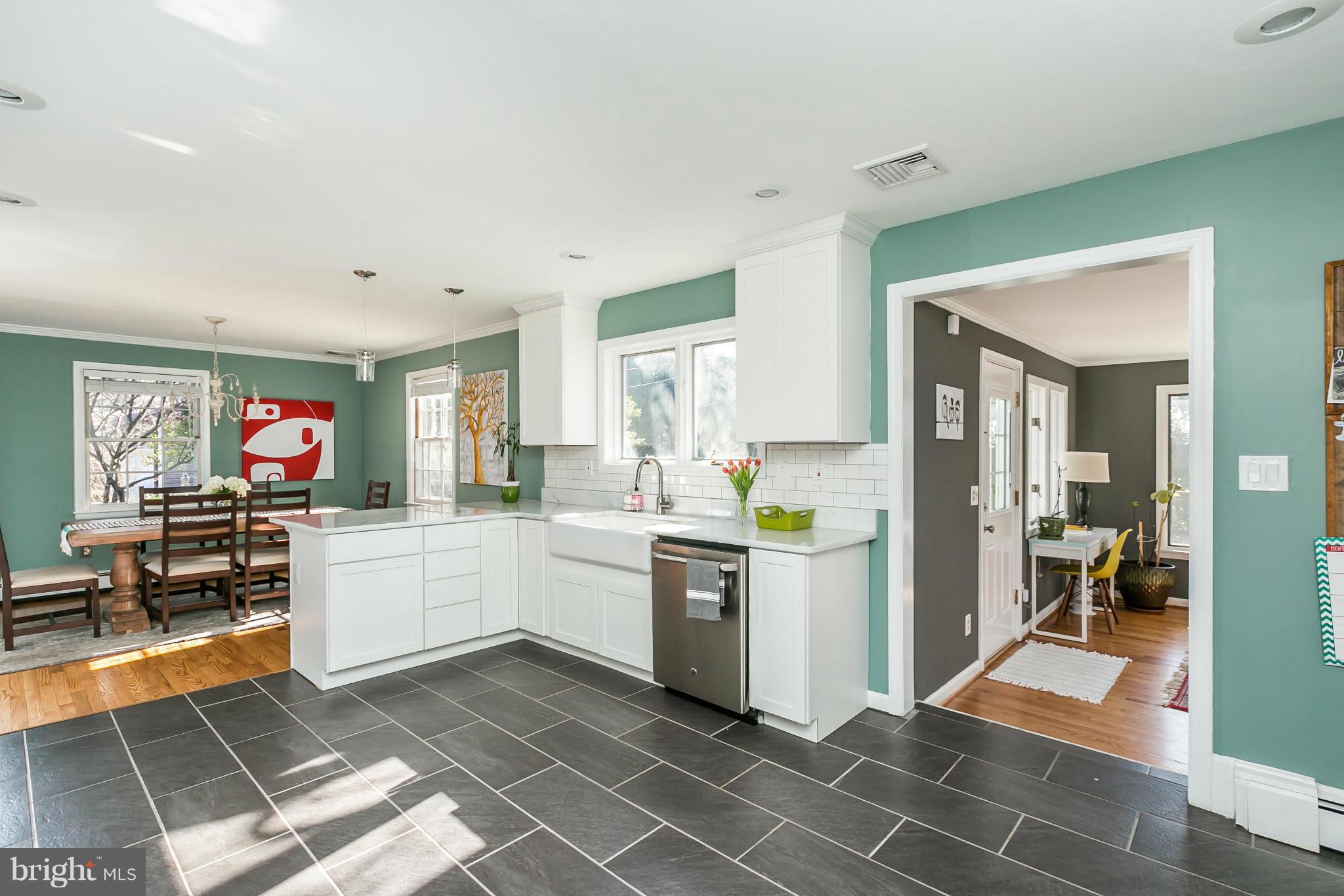 1 Beechdale Road Baltimore, MD 21210 - Photo 9 of 28 a kitchen with a sink and a stove top oven