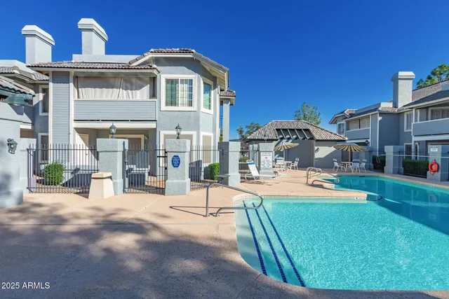 a view of a house with outdoor space and sitting area