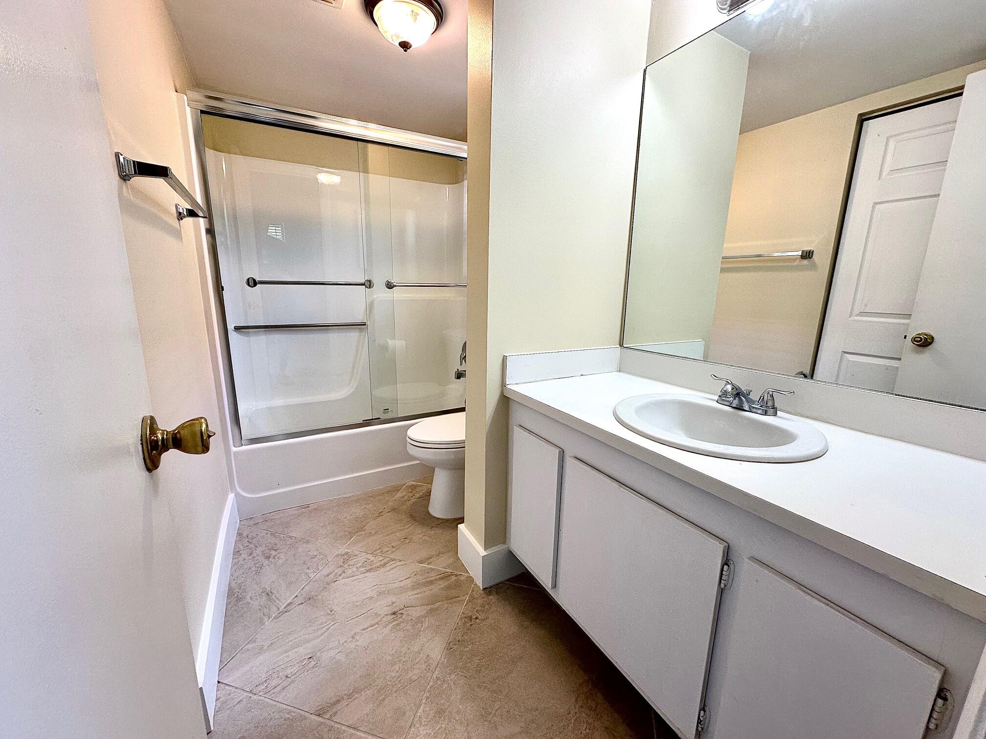 21904 Lake Forest Circle, Unit 101 Boca Raton, FL 33433 - Photo 8 of 11 Primary bathroom