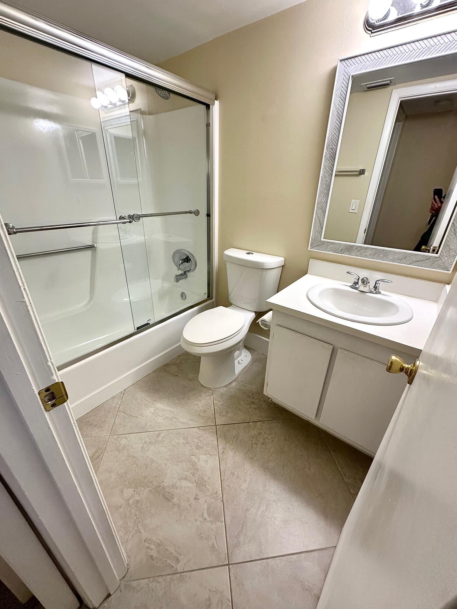 21904 Lake Forest Circle, Unit 101 Boca Raton, FL 33433 - Photo 9 of 11 Guest bathroom