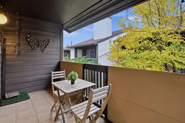 a room with a table and chairs