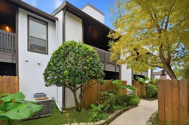 a plant that is in front of a house