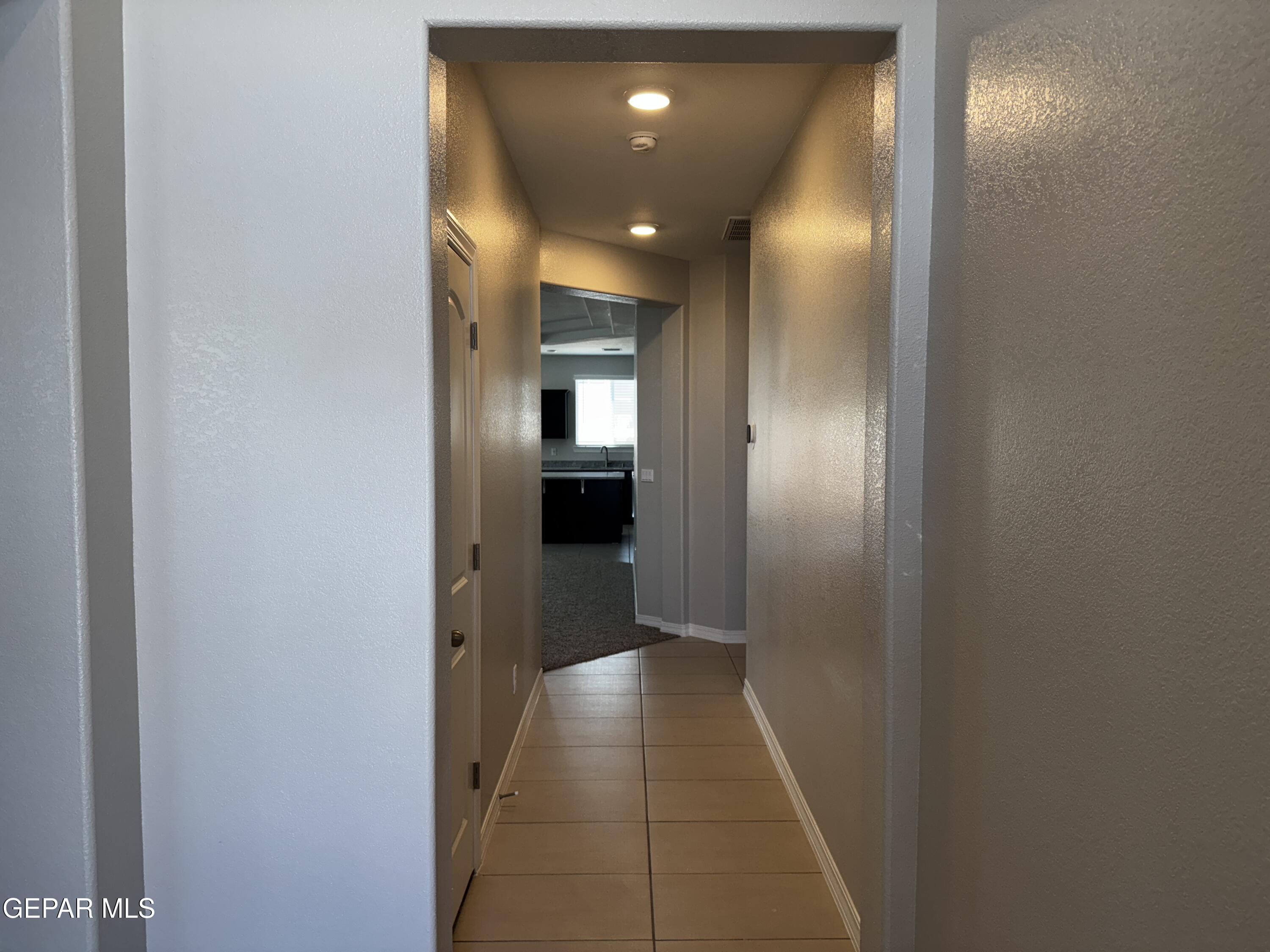 14434 Aria Lopez Drive El Paso, TX 79938 - Photo 13 of 37 a view of hallway with entryway