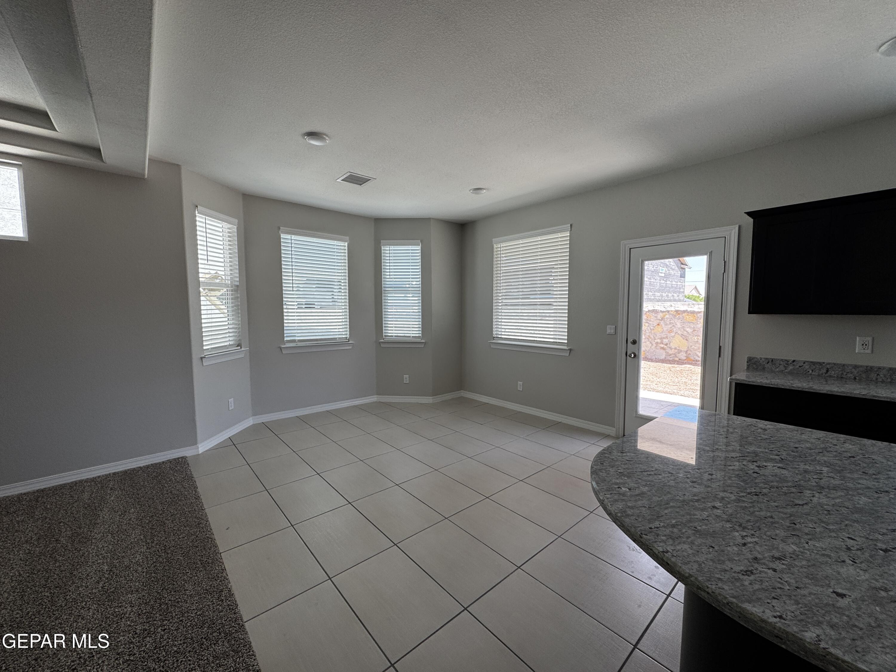 14434 Aria Lopez Drive El Paso, TX 79938 - Photo 20 of 37 a view of an empty room and window