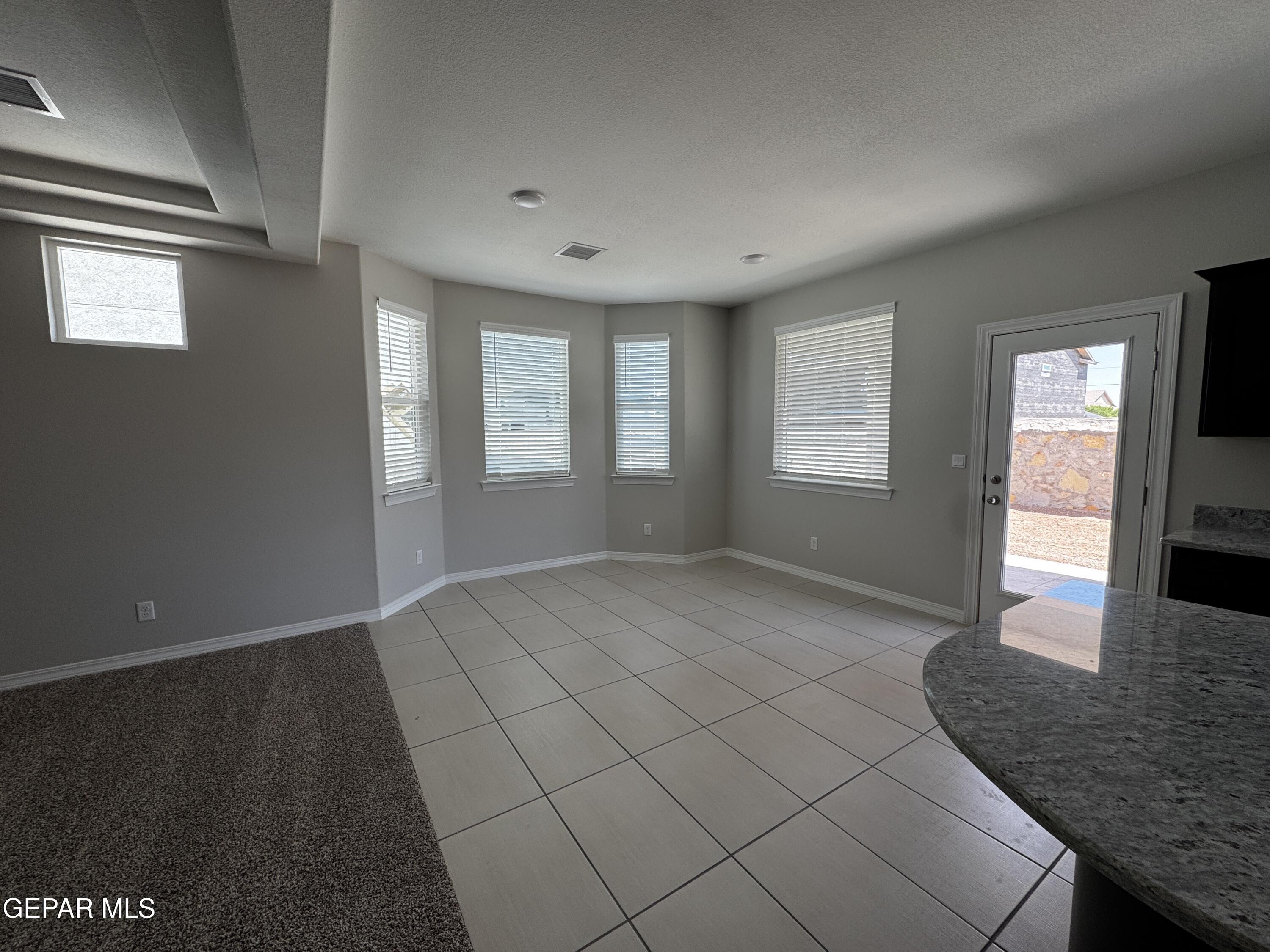 14434 Aria Lopez Drive El Paso, TX 79938 - Photo 21 of 37 a view of an empty room and window