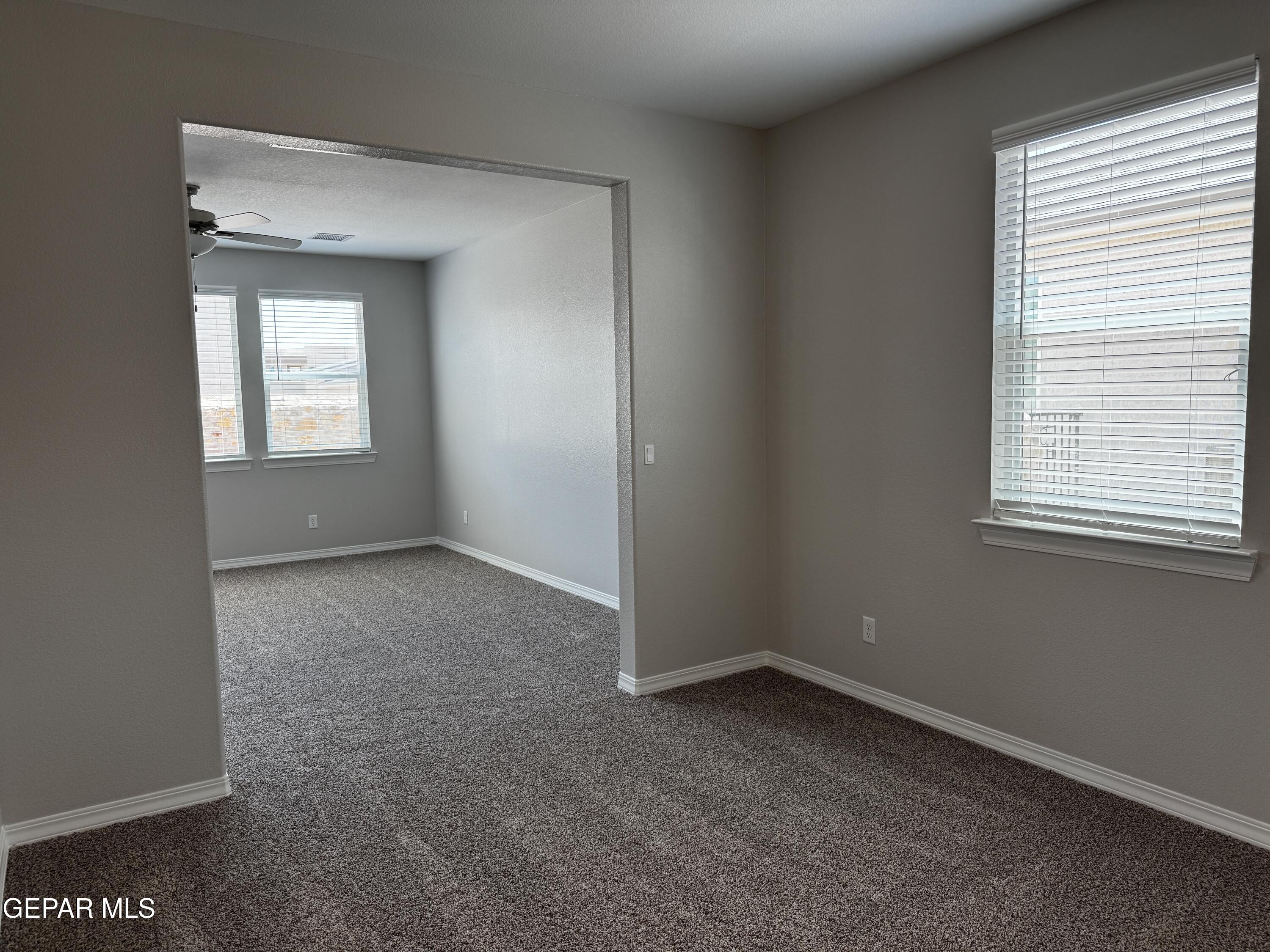 14434 Aria Lopez Drive El Paso, TX 79938 - Photo 27 of 37 an empty room with a window