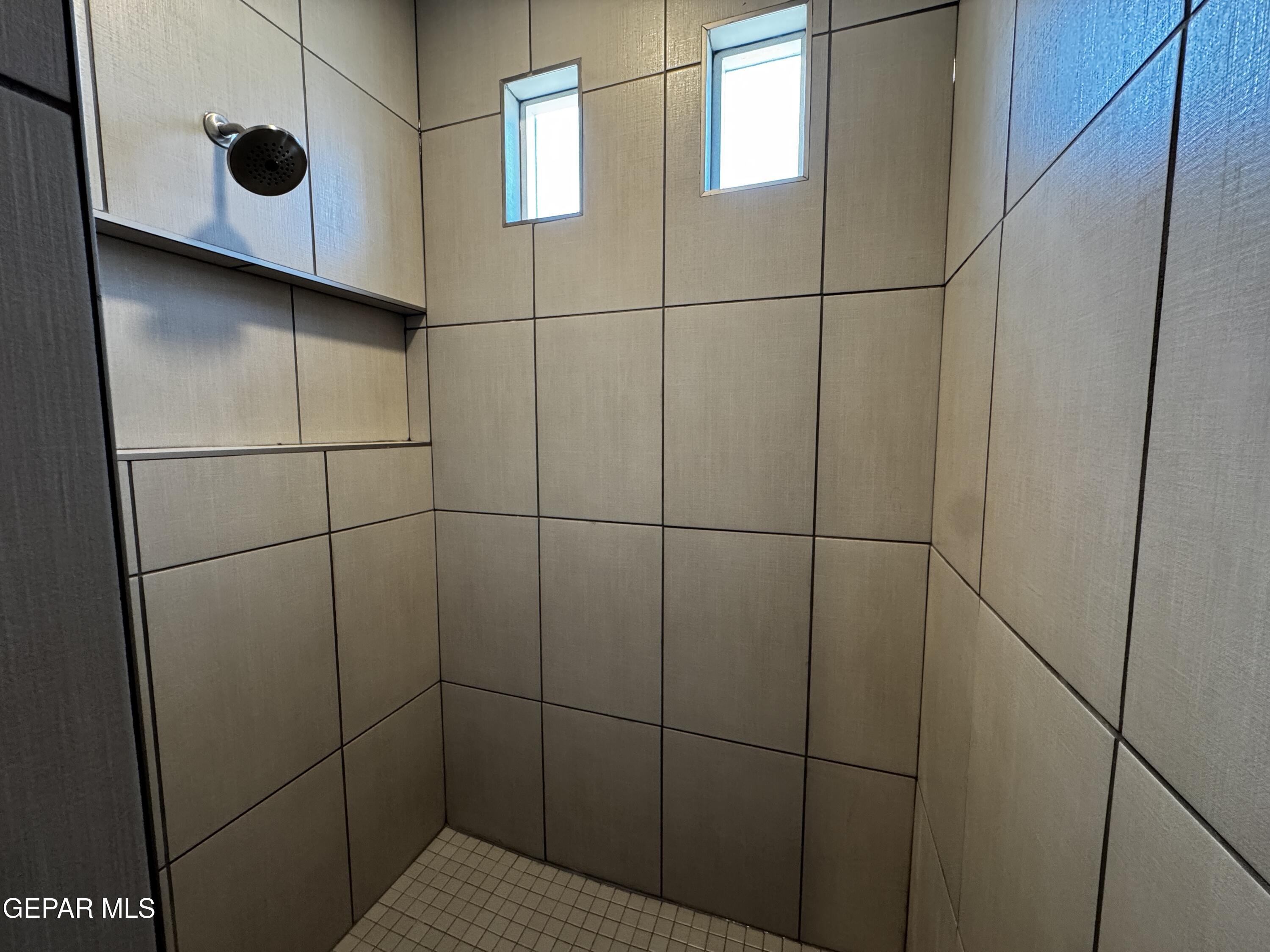 14434 Aria Lopez Drive El Paso, TX 79938 - Photo 29 of 37 a bathroom with a shower