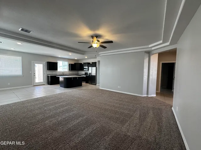a view of a livingroom with a flat screen tv