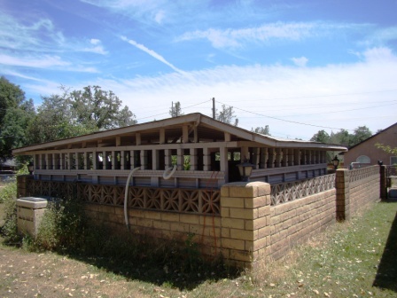 12221 Sandstone Drive Redding, CA 96003 - Photo 11 of 33 a front view of a house with a yard