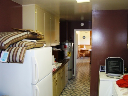 12221 Sandstone Drive Redding, CA 96003 - Photo 20 of 33 a bedroom with a bed and a view of en suite bathroom