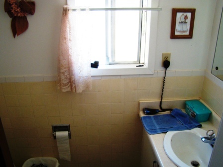 12221 Sandstone Drive Redding, CA 96003 - Photo 21 of 33 a bathroom with a sink and a mirror