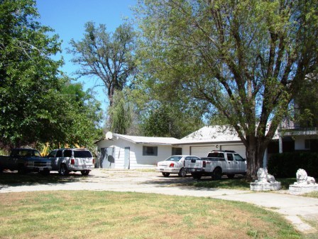 12221 Sandstone Drive Redding, CA 96003 - Photo 4 of 33 a view of a town with cars parked in front of a house