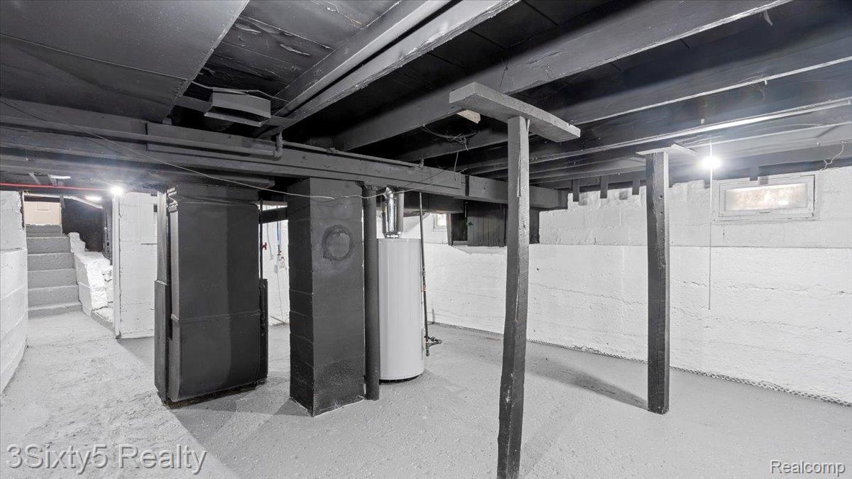 202 Haltiner Street River Rouge, MI 48218 - Photo 14 of 19 Unfinished below grade area featuring heating unit and water heater