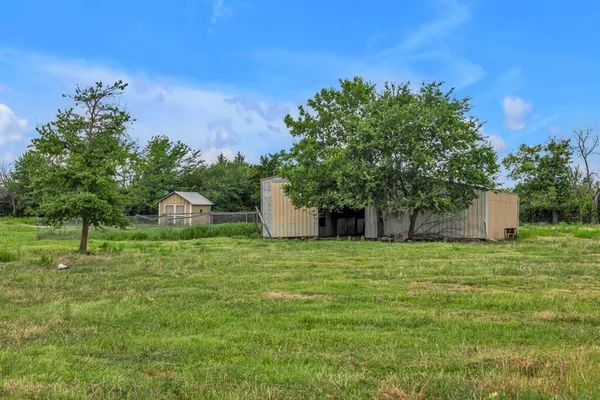 a fire hydrant in the middle of a field