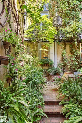 a view of swimming pool with a patio