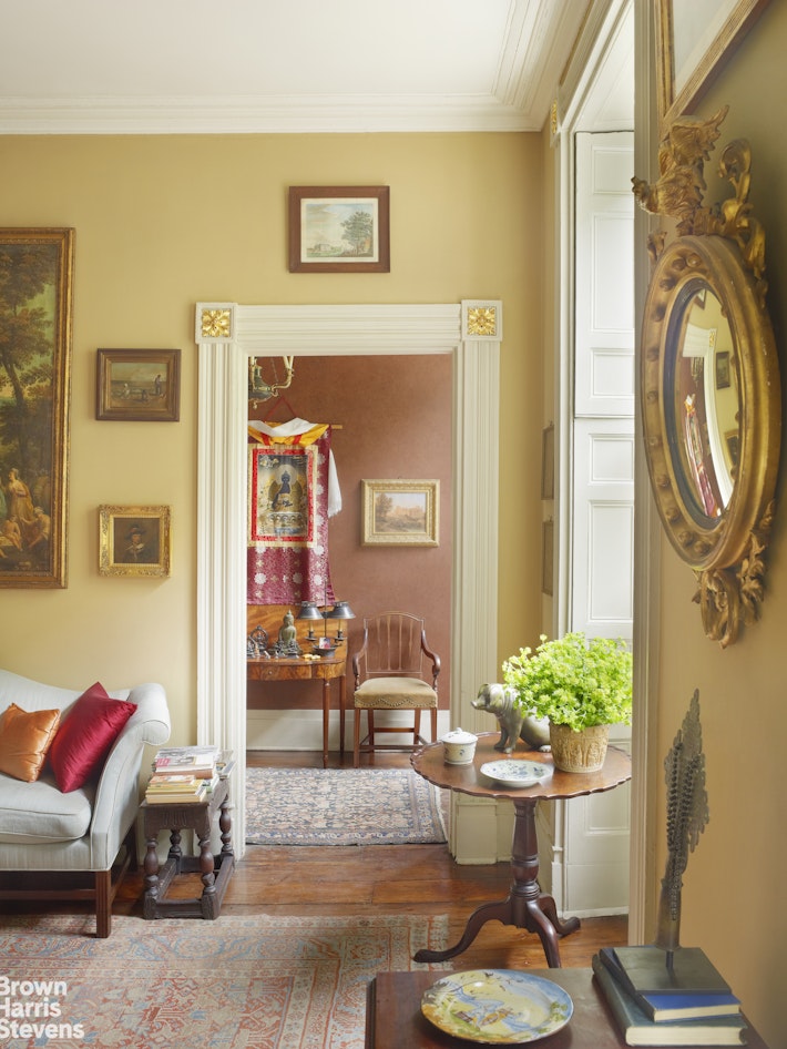 203 Prince Street Manhattan, NY 10012 - Photo 33 of 45 a living room with furniture and potted plant
