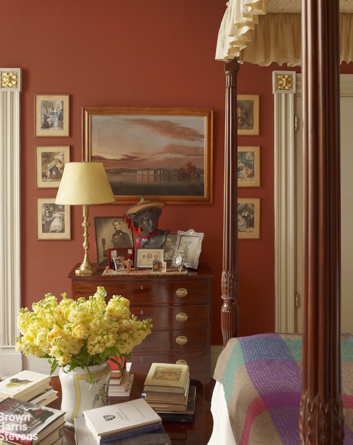 203 Prince Street Manhattan, NY 10012 - Photo 36 of 45 a living room with furniture and a lamp