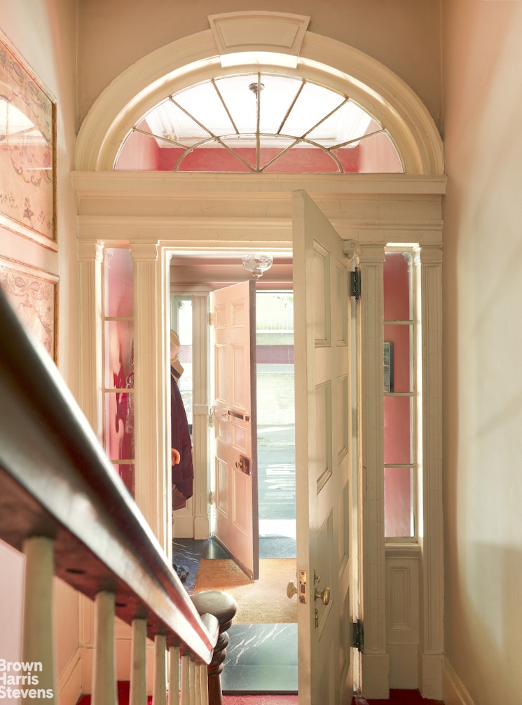203 Prince Street Manhattan, NY 10012 - Photo 3 of 45 a view of an entryway with a floor to ceiling window