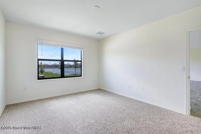 an empty room with windows