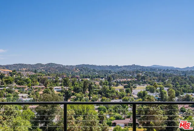 an aerial view of residential house with outdoor space